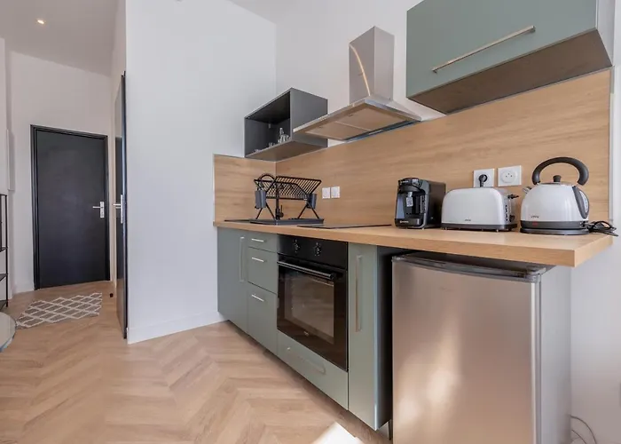 La Perle Citadine En Hyper Centre Апартаменты *